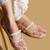 White embroidered satin ballerinas