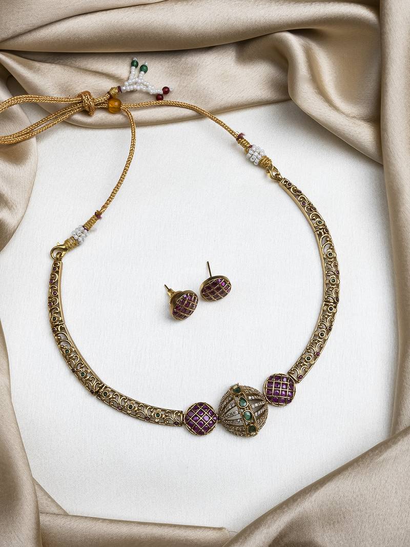  ruby green ad filgree hasli set with small studs
