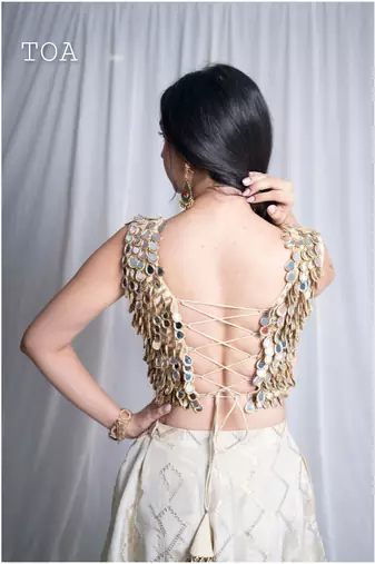 Gold embroidered silk top