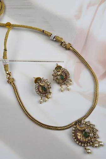 Ruby ad peacock pendant with earrings