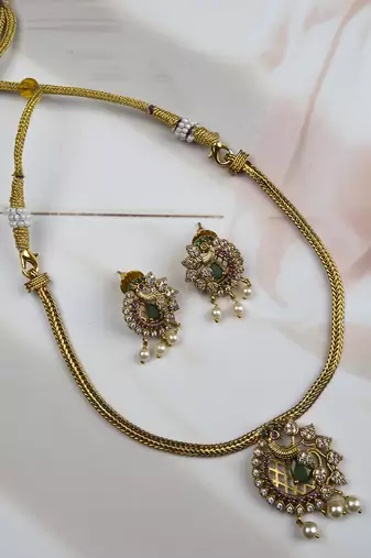 Ruby ad peacock pendant with earrings