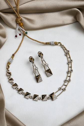 Gold plated ad stone symmetrical necklace set