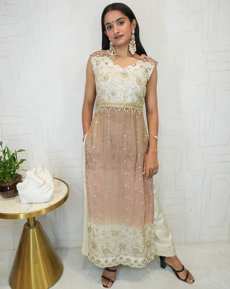 Sleeve less embroidered ethnic kurti with pant