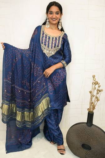 Handcrafted luxurious bandhani suit.