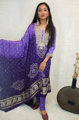 Handcrafted luxurious bandhani suit.