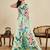 Light green chinon printed saree with floral & peacock design, party wear saree with blouse