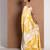 Yellow printed satin saree with blouse piece