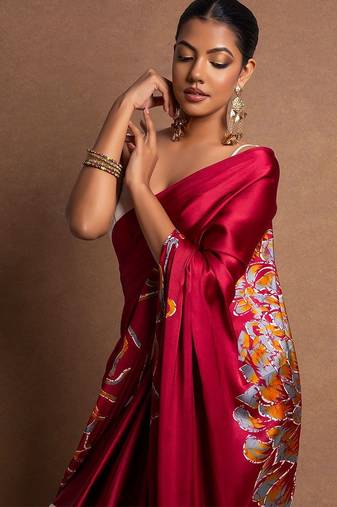 Red printed satin saree with blouse piece
