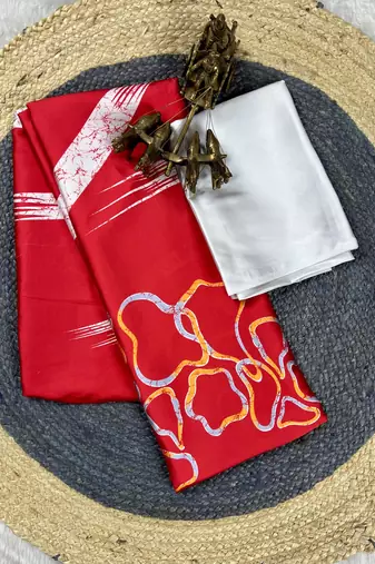 Red printed satin saree with blouse piece