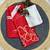 Red printed satin saree with blouse piece