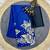Blue printed satin saree with blouse piece