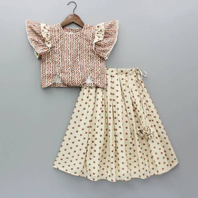 Beige & rust printed rayon lehenga choli for girls – stylish festive outfit with ruffled sleeves