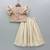 Beige & rust printed rayon lehenga choli for girls – stylish festive outfit with ruffled sleeves