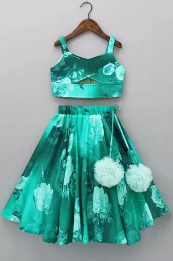 Teal green floral printed rayon lehenga choli for girls – sleeveless partywear set with pom-pom detail