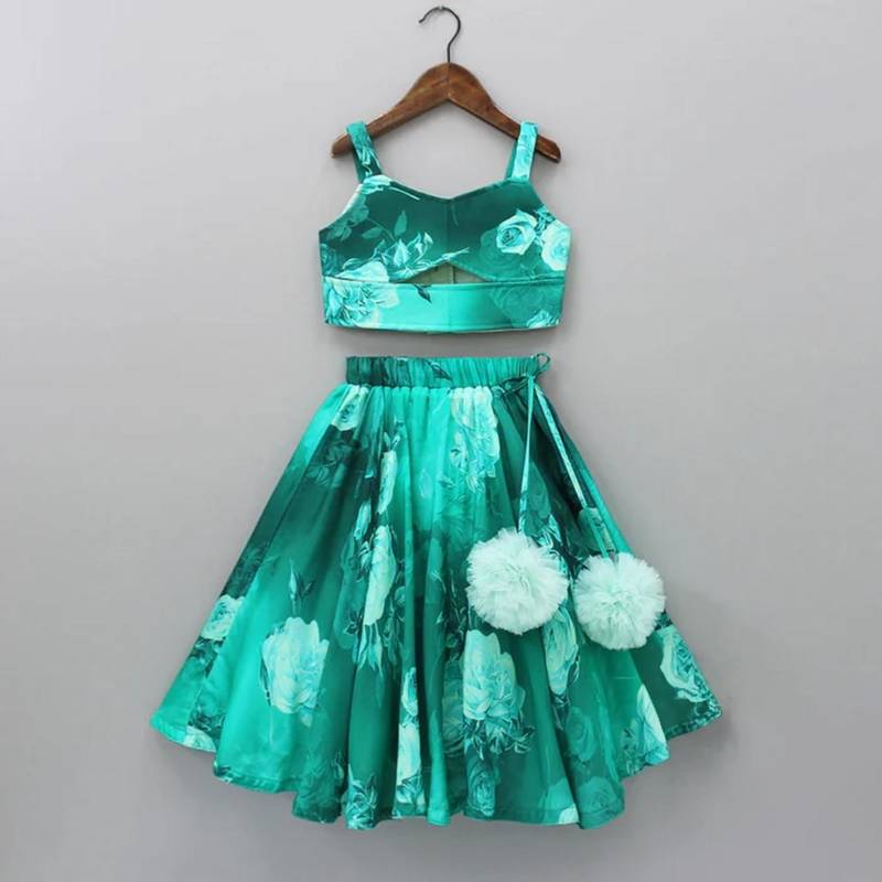 Teal green floral printed rayon lehenga choli for girls – sleeveless partywear set with pom-pom detail