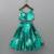 Teal green floral printed rayon lehenga choli for girls – sleeveless partywear set with pom-pom detail