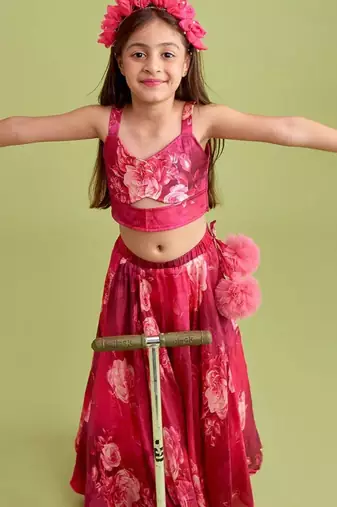 Wine pink floral printed rayon lehenga choli for girls sleeveless festive wear set with pom-poms