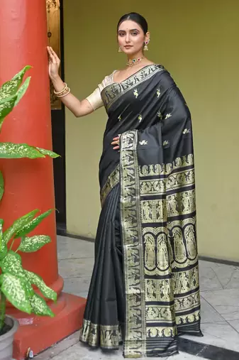 Black pure handwoven baluchari silk saree with exquisite resham work in golden color