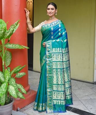 Green dual toned  handwoven baluchari silk blend saree with exquisite resham work in copper color 1