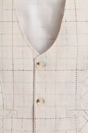 Beige cotton woven sleeveless checks waistcoat
