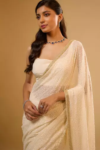 Ivory embroidered georgette saree