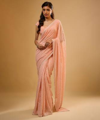 Peach embroidered georgette saree 1
