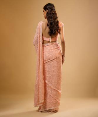 Peach embroidered georgette saree 4