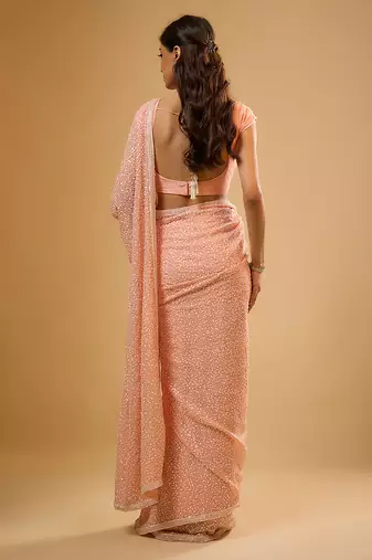 Peach embroidered georgette saree