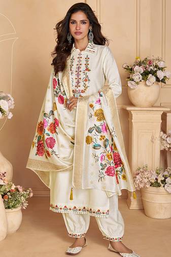 Cream color viscose silk fabric designer embroidered ceremonial salwar kameez
