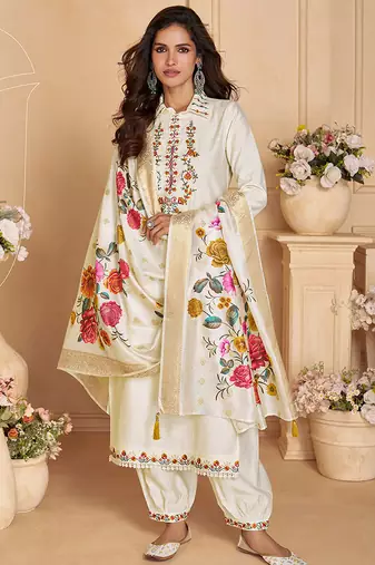 Cream color viscose silk fabric designer embroidered ceremonial salwar kameez