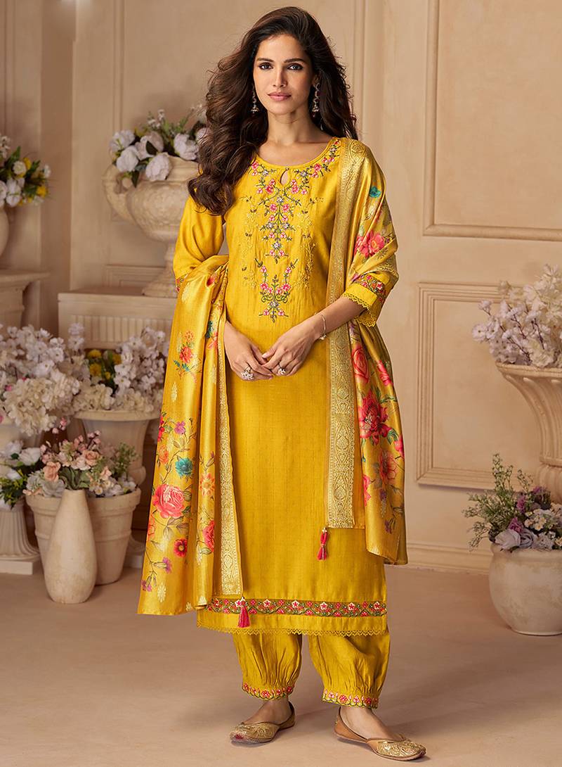 Yellow color viscose silk fabric designer embroidered ceremonial salwar kameez