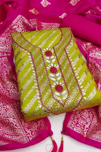 Vibrant lime green suit set with pink banarasi dupatta and embellished neckline