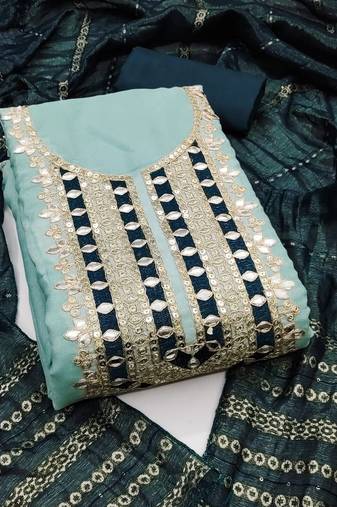Pastel blue suit set with teal mirror work and embroidered dupatta