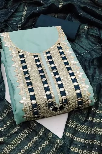 Pastel blue suit set with teal mirror work and embroidered dupatta