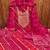 Deep magenta suit set with intricate mirror work and embroidered dupatta