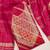Deep magenta suit set with intricate mirror work and embroidered dupatta