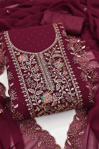 Maroon georgette suit set with intricate golden zari embroidery and floral accents