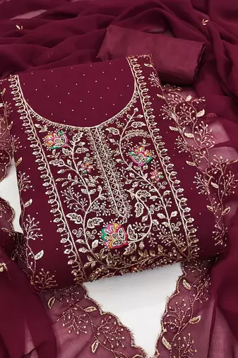 Maroon georgette suit set with intricate golden zari embroidery and floral accents