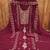 Maroon georgette suit set with intricate golden zari embroidery and floral accents