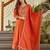 Women's embroidered orange vichitra silk flared kurta, rayon pant & dupatta set
