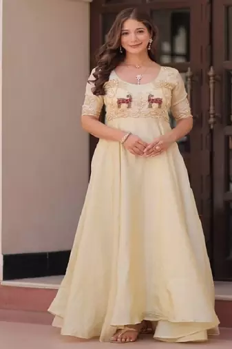 Gold crush beads embroidered gown.