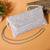 Osty sitara – premium hand-zari embellished bridal clutch with beaded handle & gold chain-white