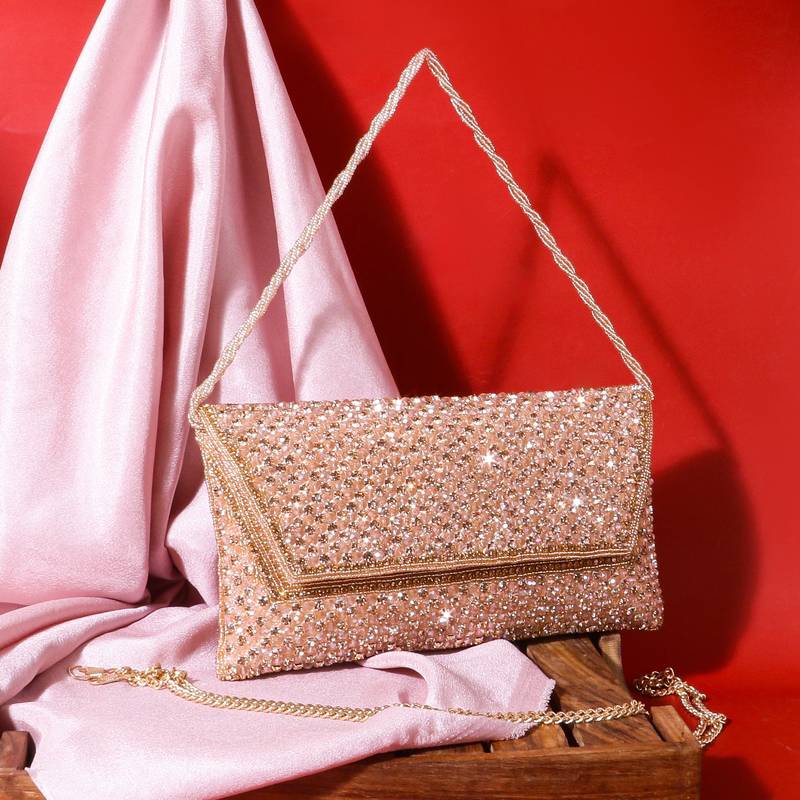 Osty sitara – premium hand-zari embellished bridal clutch with beaded handle & gold chain-gold