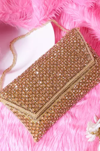 Osty sitara – premium hand-zari embellished bridal clutch with beaded handle & gold chain-beige