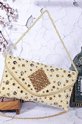 Osty aurelia – handcrafted diamond zari clutch with dual handle-gold
