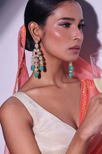Green gold plated kundan earrings