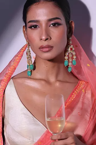 Green gold plated kundan earrings