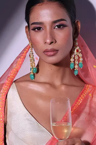 Green gold plated kundan earrings