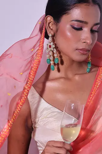 Green gold plated kundan earrings