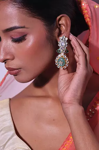 Green gold plated kundan earrings